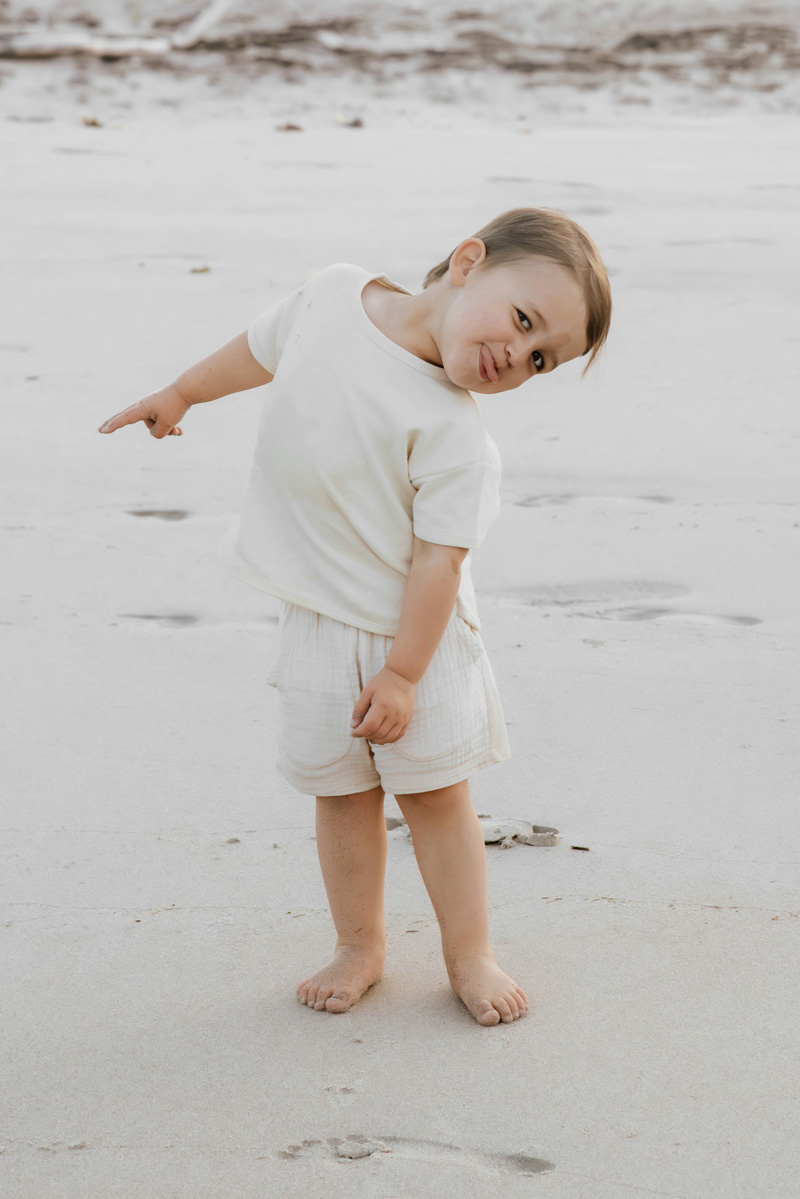 Learning how to photograph families without stiff posing results in personality-filled moments just like this!