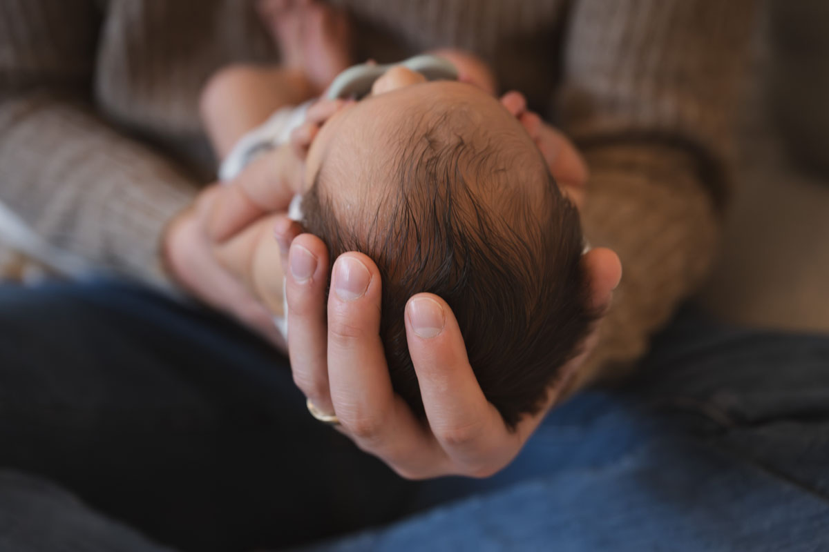 in-home newborn session Boston lifestyle photography with baby Calvin